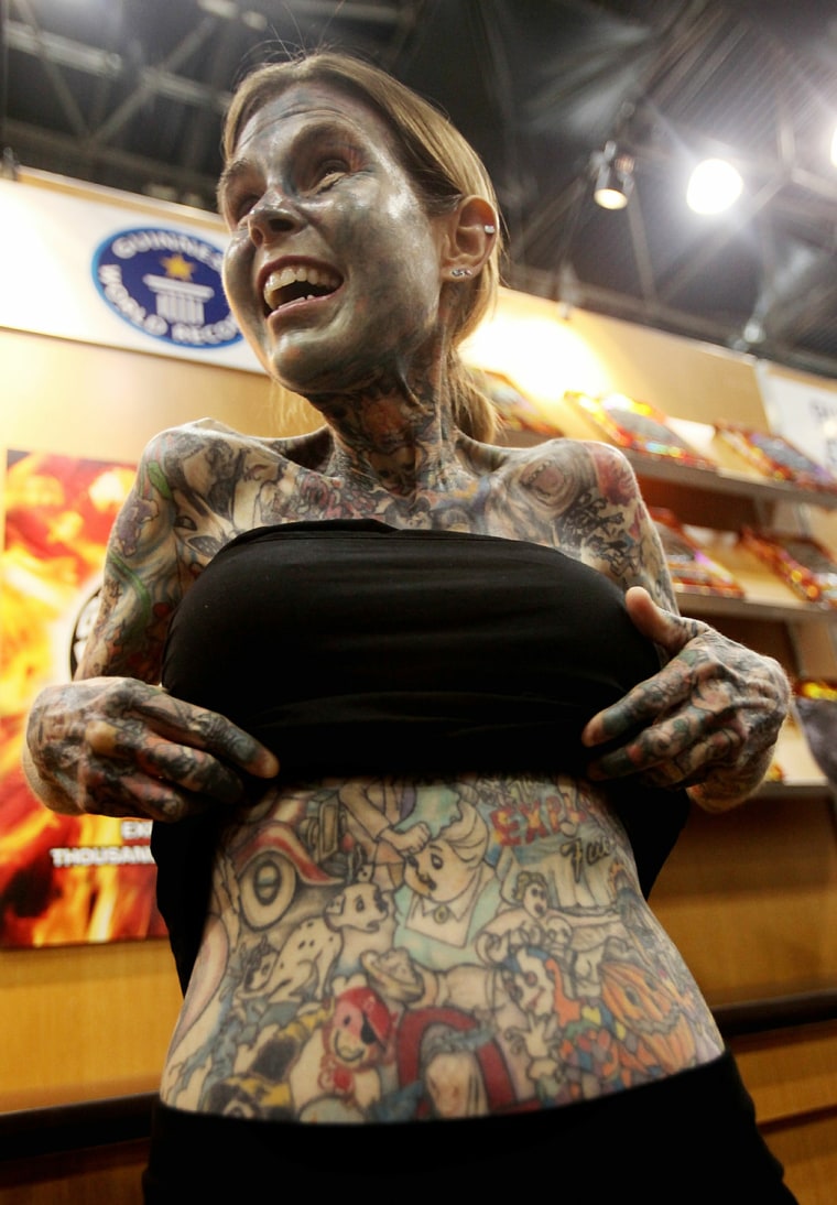 Image: Guinness World Records' \"Most Tattooed Woman\" Visits Book Expo America
